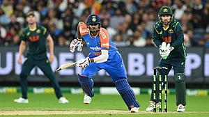James Ross/AAP Image via AP : India's Harshit Rana, center, bats against Australia during their T20 cricket match in Melbourne, Australia, Friday, Oct. 31, 2025