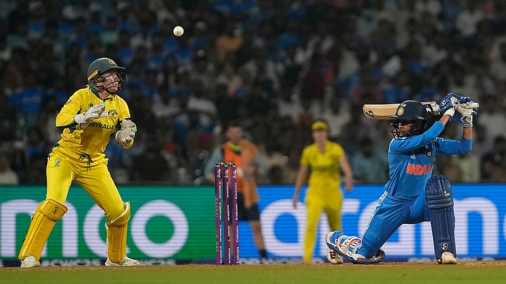 AP : Jemimah Rodrigues plays a shot as Alyssa Healy looks on during the ICC Women's Cricket World Cup semi-final between India and Australia at DY Patil Stadium in Navi Mumbai.