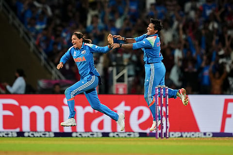 India's captain Harmanpreet Kaur, left, and India's Deepti Sharma celebrate the dismissal of South Africa's captain Laura Wolvaardt during the ICC Women's Cricket World Cup final match between India and South Africa in Navi Mumbai.