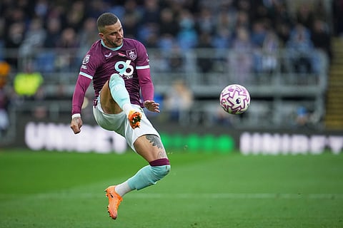 Burnley's Kyle Walker in action during the English Premier League soccer match between Burnley and Arsenal in Burnley, England.
