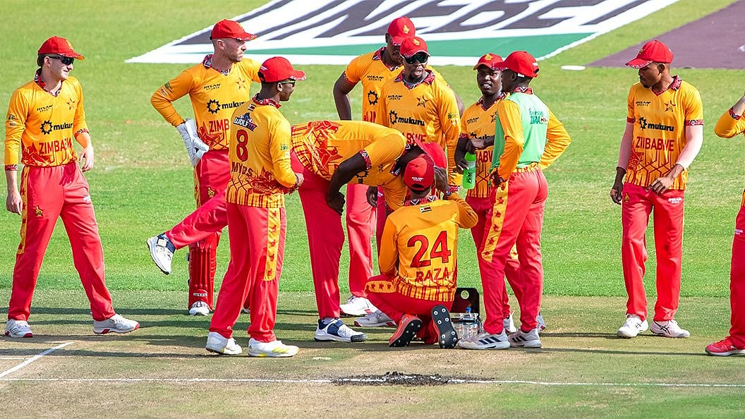 | Photo: X/ZimCricketv : Zimbabwe cricket team in action against Afghanistan during the second T20I in Harare on October 31, 2025.