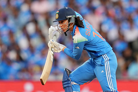 India's Smriti Mandhana plays a shot during the ICC Women's Cricket World Cup final match between India and South Africa in Navi Mumbai.