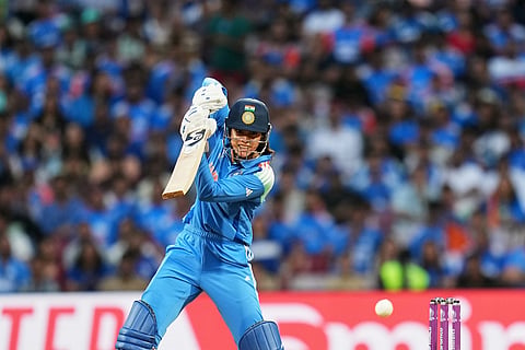 India's Smriti Mandhana plays a shot during the ICC Women's Cricket World Cup final match between India and South Africa in Navi Mumbai.
