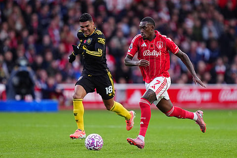 Nottingham Forest's Callum Hudson-Odoi, right, and Manchester United's Casemiro in action during the English Premier League match between Nottingham Forest and Manchester United in Nottingham, England.