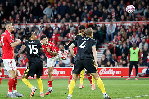 Nottingham Forest's Morgan Gibbs-White, third left, scores during the English Premier League match between Nottingham Forest and Manchester United in Nottingham, England.