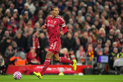 Liverpool's Virgil van Dijk in action during the English Premier League soccer match between Liverpool and Aston Villa in Liverpool, England.