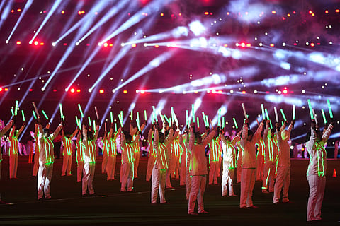 Artists perform during the ICC Women's Cricket World Cup final match between India and South Africa in Navi Mumbai.