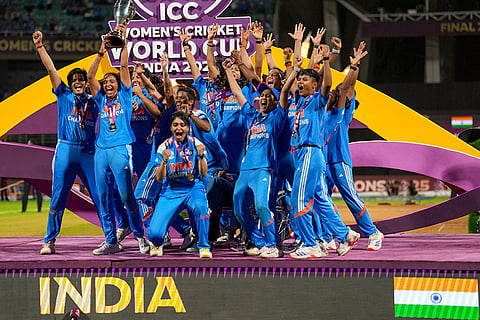 India’s players celebrate with the trophy during the presentation ceremony after winning the ICC Women's World Cup 2025, at the DY Patil Stadium, in Navi Mumbai.