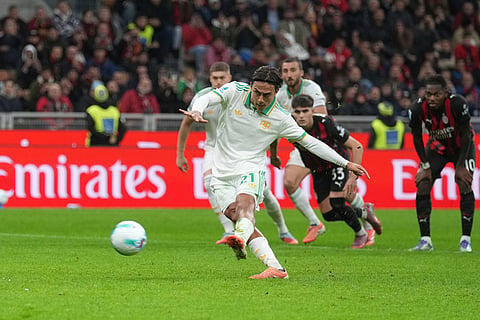 Roma's Paulo Dybala misses to score the penalty during the Serie A soccer match between AC Milan and Roma in Milan, Italy.