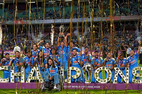 India’s players celebrate with the trophy during the presentation ceremony after winning the ICC Women's World Cup 2025, at the DY Patil Stadium, in Navi Mumbai.