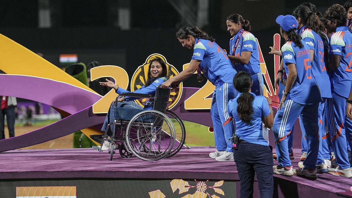 PTI : Smriti Mandhana brings teammate Pratika Rawal on a wheelchair as the Indian team receives winning medals during the presentation ceremony of the ICC Women's World Cup 2025, at the DY Patil Stadium in Navi Mumbai.