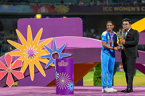 ICC Chairman Jay Shah, right, hands over the trophy to India’s captain Harmanpreet Kaur during the presentation ceremony after winning the ICC Women's World Cup 2025, at the DY Patil Stadium, in Navi Mumbai.