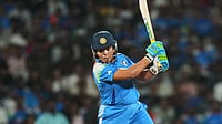 | Photo: AP/Rafiq Maqbool : India's Richa Ghosh plays a shot during the ICC Women's Cricket World Cup final match between India and South Africa in Navi Mumbai, India, Sunday, Nov. 2, 2025.