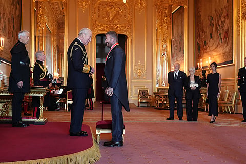 Sir David Beckham is made a Knight Bachelor by Britain's King Charles III during an Investiture ceremony at Windsor Castle, Berkshire, England.
