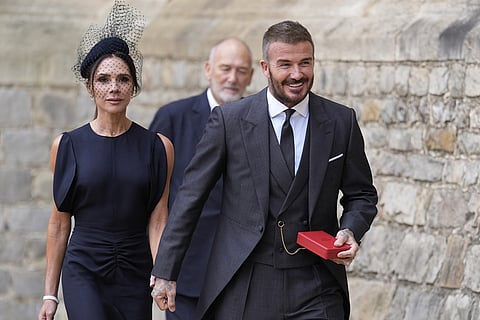 Sir David Beckham, with his wife Victoria, after he was made a Knight Bachelor at an investiture ceremony at Windsor Castle, Windsor, England.
