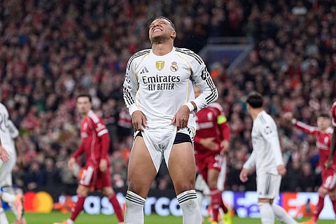 Real Madrid's Kylian Mbappe reacts during the Champions League soccer match between Liverpool and Real Madrid in Liverpool, England.