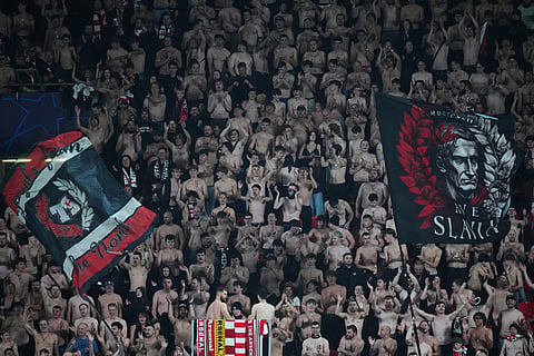 Slavia Prague fans cheer during the Champions League opening phase soccer match between Slavia Prague and Arsenal in Prague, Czech Republic.