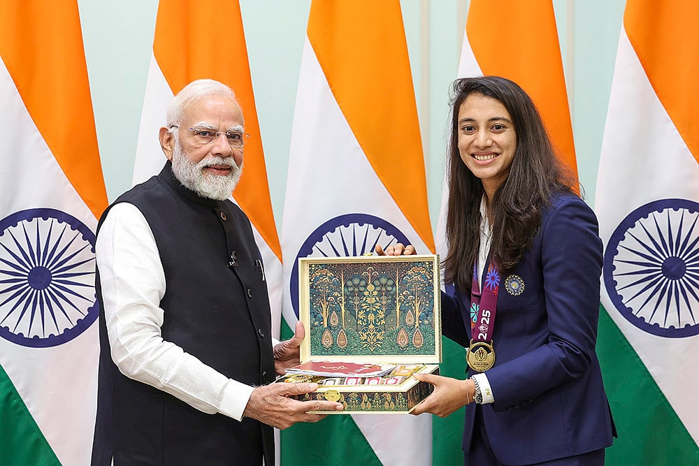 Prime Minister Narendra Modi with Smriti Mandhana