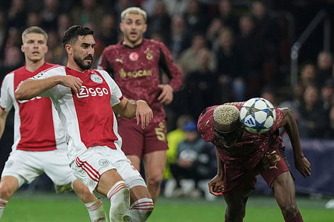 Galatasaray's Victor Osimhen scores during the Champions League between Ajax and Galatasaray in Amsterdam, Netherlands.
