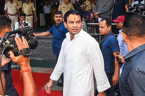 Janshakti Janata Dal (JJD) chief Tej Pratap Yadav arrives at a polling station to cast his vote during the first phase of the Bihar Assembly elections, in Patna.