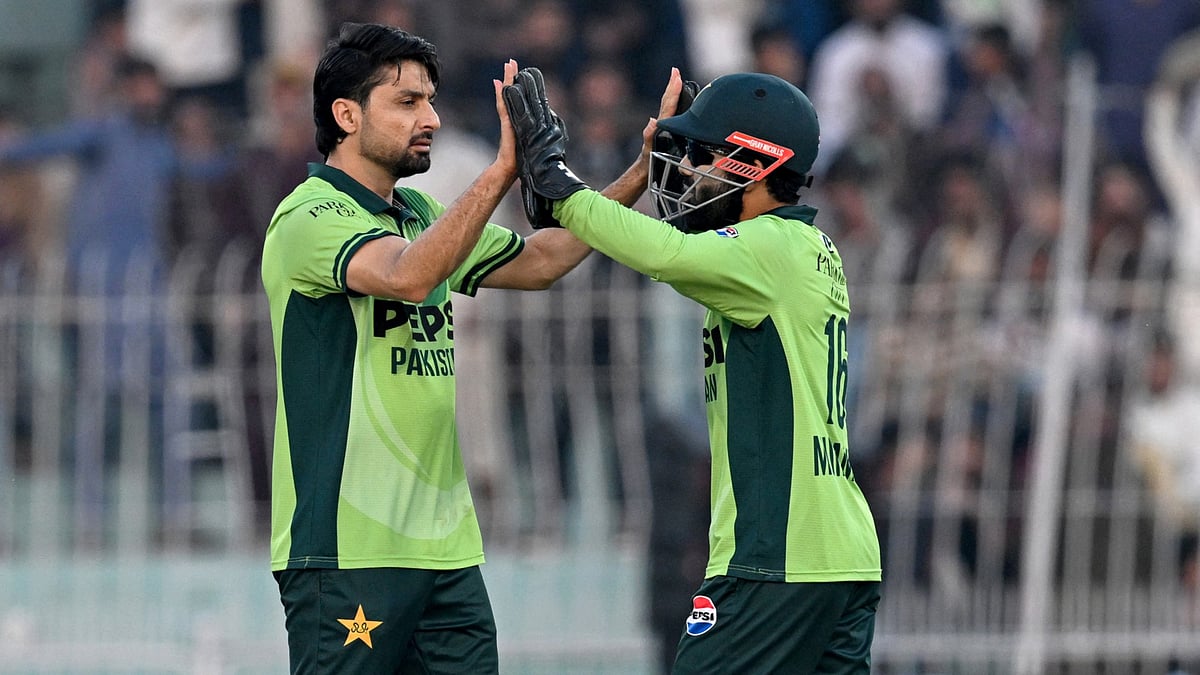 Abrar Ahmed celebrates a wicket with Mohammad Rizwan