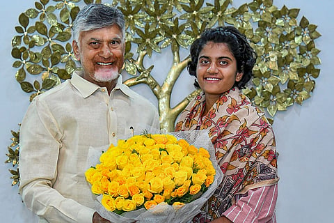 In this image, Andhra Pradesh Chief Minister N. Chandrababu Naidu with N. Shree Charani, member of the Women's ODI World Cup 2025-winning Indian cricket team, during a meeting, in Hyderabad.