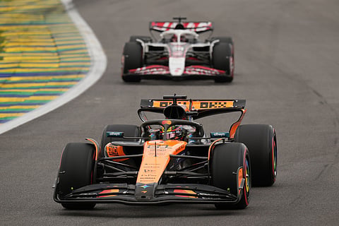 McLaren driver Oscar Piastri of Australia, front, drives during the qualifying session ahead of the Brazilian Formula One Grand Prix at the Interlagos race track, in Sao Paulo.