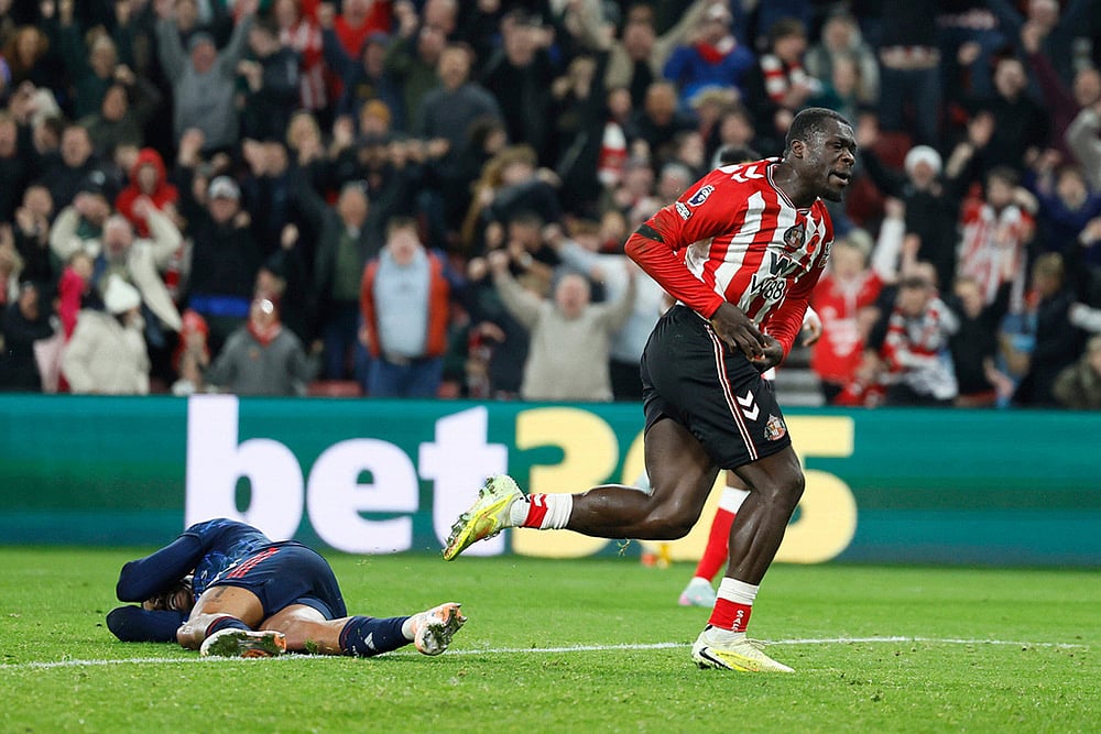 | Photo: Richard Sellers/PA via AP : Sunderland's Brian Brobbey celebrates scoring their side's second goal of the game against Arsenal during the Premier League match in Sunderland, England.