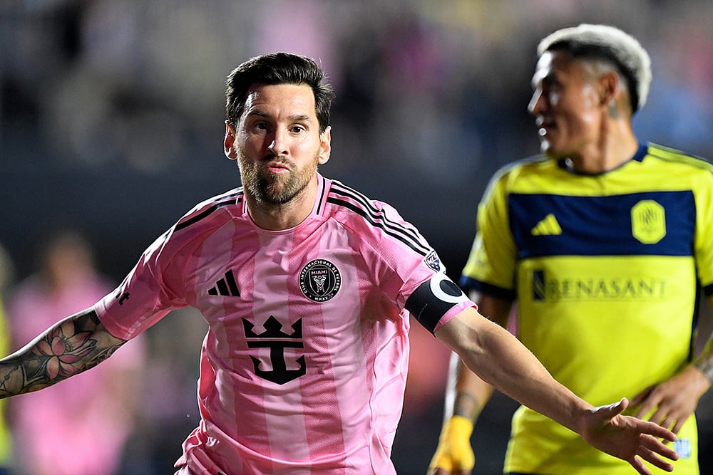 | Photo: AP/Michael Laughlin : Inter Miami forward Lionel Messi, left, celebrates after scoring in front of Nashville SC midfielder Andy Najar, right, during the first half of Game 3 in the first round of MLS soccer's Western Conference playoffs in Fort Lauderdale, Florida.