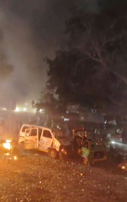 Damaged vehicles at the spot after a blast occurred in a parked car near Red Fort, leaving multiple vehicles in flames, in New Delhi. At least eight people were killed and 24 others suffered injuries in the incident.