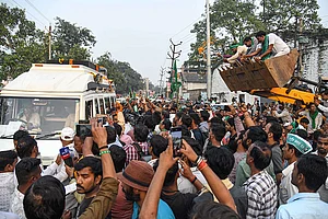 | Photo: PTI : RJD chief Lalu Prasad Yadav holds a roadshow in Danapur for party candidate Ritlal Yadav. The first phase of voting in the Bihar Elections is scheduled for November 6