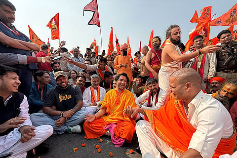 In this image posted, spiritual leader Dhirendra Shastri with cricketer Umesh Yadav and former cricketer Shikhar Dhawan during his 'Sanatan Hindu Ekta Padyatra'.