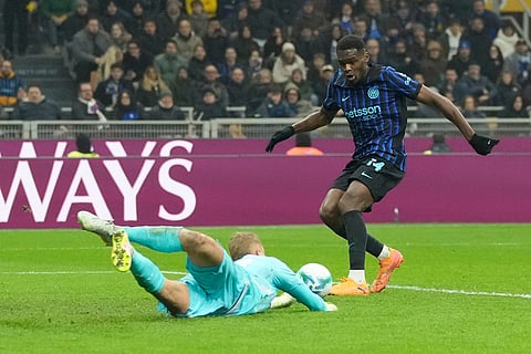 Inter Milan's Ange-Yoan Bonny scores his side's second goal during a Serie A soccer match between Inter Milan and Lazio, in Milan, Italy