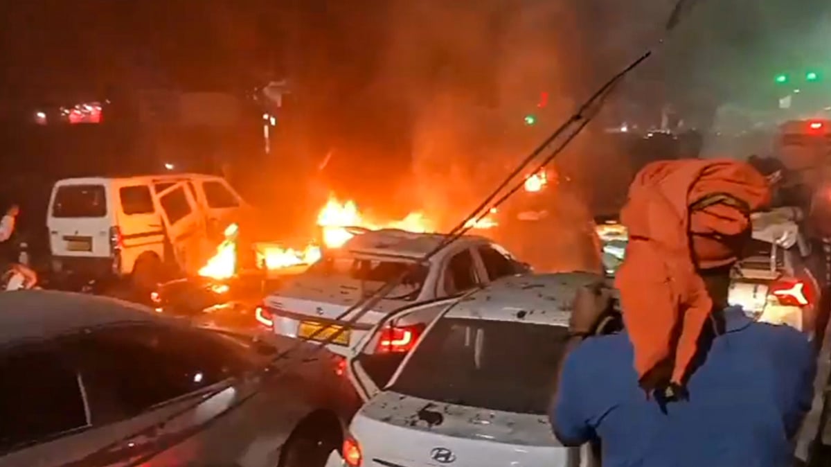 PTI : In this screengrab from a video, flames rise after a blast occurred in a parked car near Red Fort, Delhi.