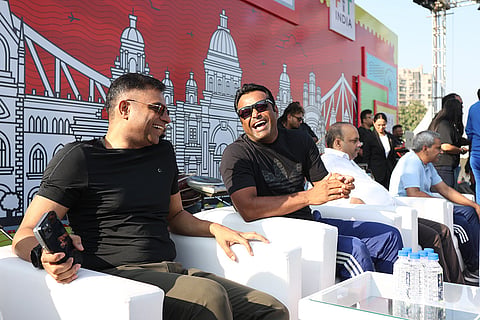 Former tennis player Leander Paes shares a laugh during Kolkata Cyclothon 2025.