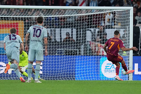 Roma's Lorenzo Pellegrini scores during the Serie A soccer match between Roma and Udinese, in Rome.