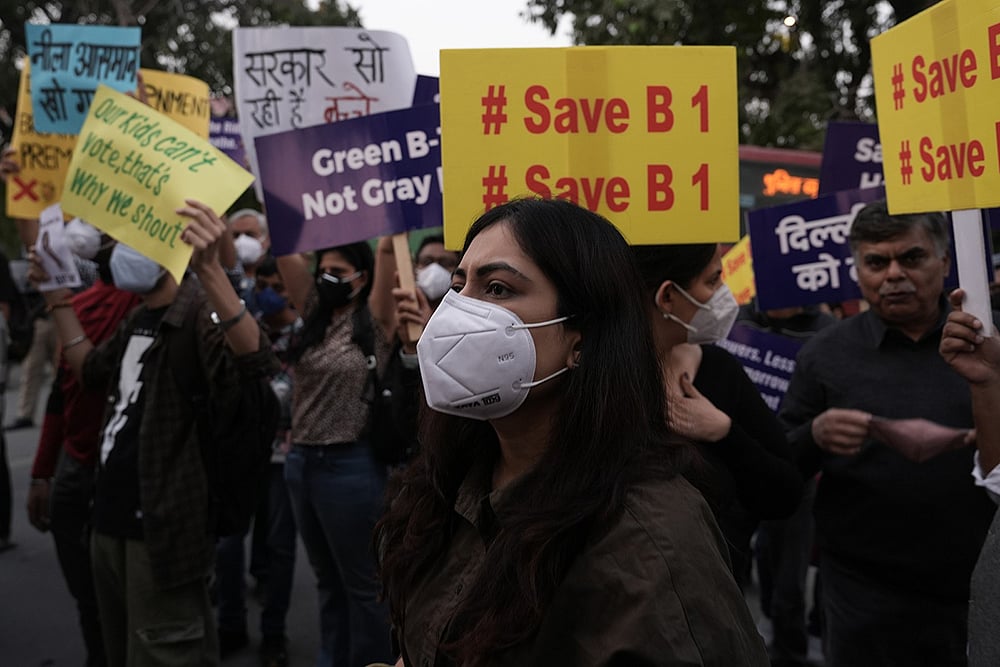 Activist protest against air pollution at India Gate detained, in New Delhi.