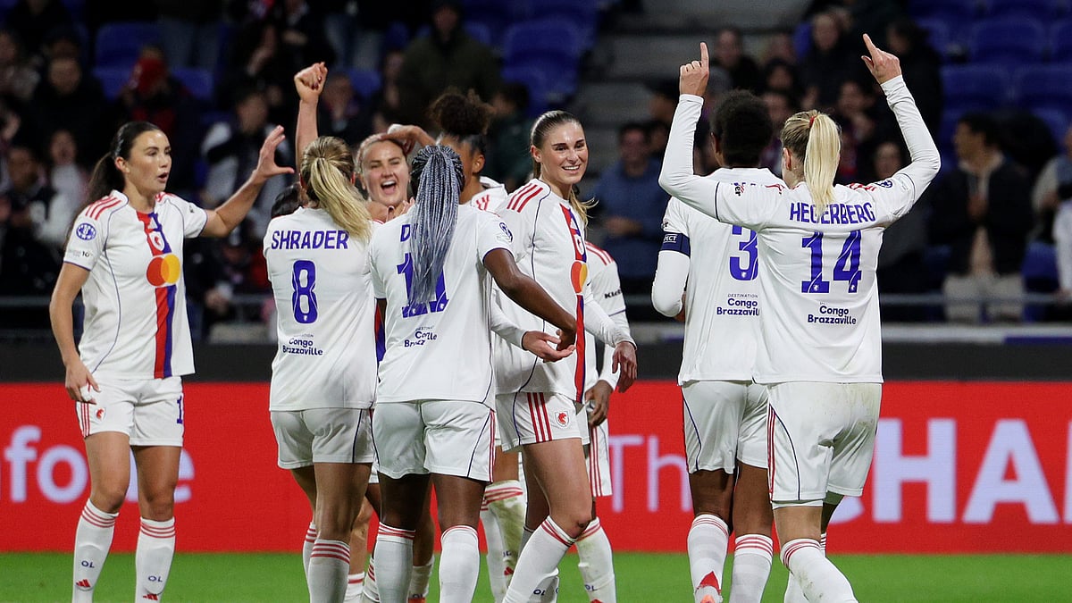 Lyon celebrate their win over Wolfsburg