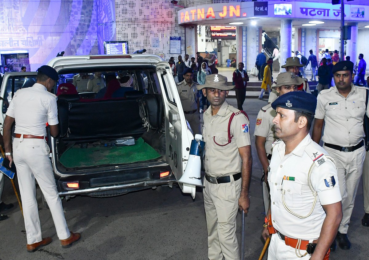 PTI : Police personnel check a vehicle parked outside Patna railway station, after security was beefed up following a blast near the Red Fort that claimed eight lives and left several injured, in Patna, Monday, Nov. 10, 2025. 