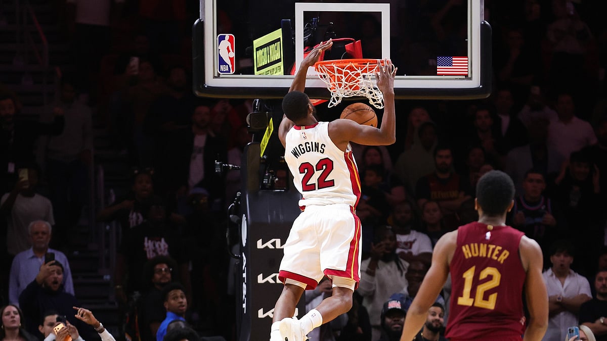 Andrew Wiggins #22 of the Miami Heat dunks the ball in overtime to defeat the Cleveland Cavaliers at Kaseya Center on November 10, 2025 in Miami, Florida.