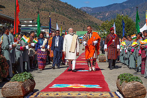 In this image, Prime Minister Narendra Modi being received by Bhutan Prime Minister Tshering Tobgay as he arrives at an airport, in Bhutan.
