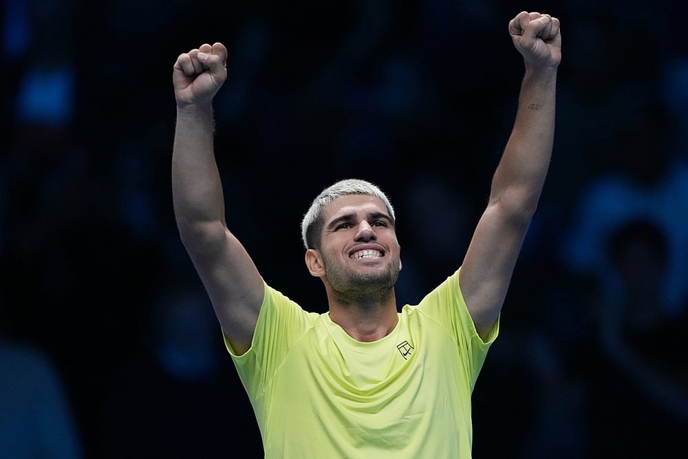 | Photo: AP/Antonio Calanni : Spain's Carlos Alcaraz celebrates after winning against United States' Taylor Fritz during their tennis match of the ATP World Tour Finals, in Turin, Italy.