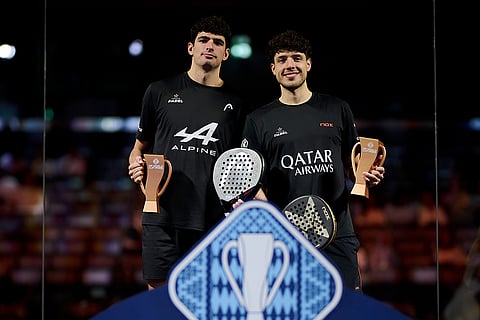 Arturo Coello and Agustin Tapia pose with their trophies during the trophy ceremony of the FIP World Cup in Pairs, Kuwait on November 9, 2025.