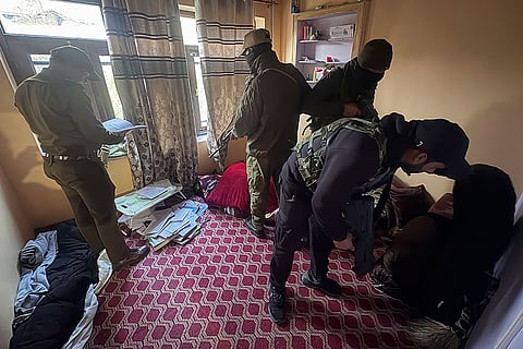 Security personnel during a crackdown against the banned organisation Jamaat-e-Islami (JeI), in Kulgam, Jammu and Kashmir.