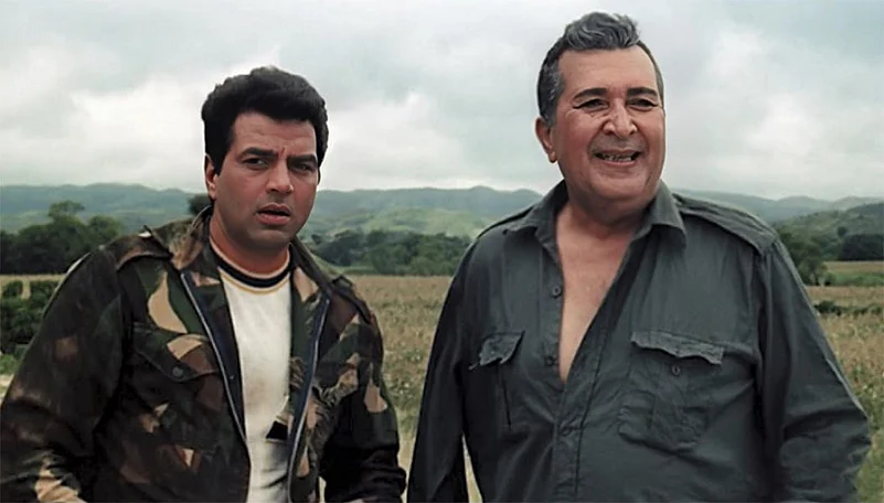 Bollywood actor Dharmendra in Mera Gaon Mera Desh (1971)