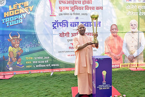 In this image, Uttar Pradesh Chief Minister Yogi Adityanath during a ceremony for trophy of FIH Hockey Men's Junior World Cup 2025, in Lucknow.