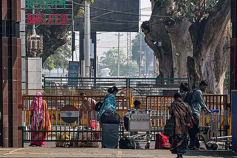 Bangladeshi citizens cross the India-Bangladesh Border from India, at Petrapole, in North 24 Parganas.