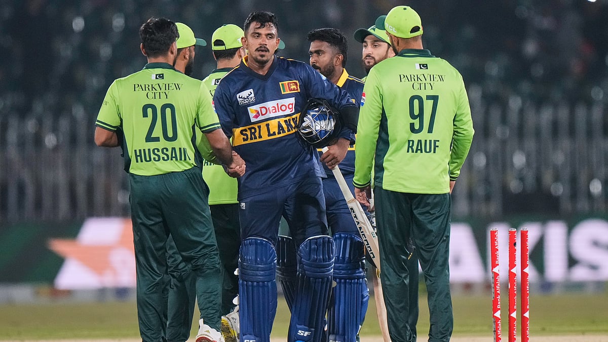 | Photo: AP.Anjum Naveed : Sri Lanka's Mahesh Theekshana and Asitha Fernando shakes hand with Pakistani players on the end of the first ODI in Rawalpindi, on Tuesday, November 11, 2025.