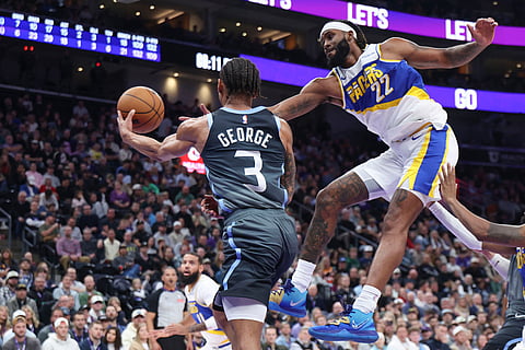 Utah Jazz guard Keyonte George (3) passes the ball as Indiana Pacers forward Isaiah Jackson (22) defends during the first half of an NBA basketball game in Salt Lake City. 