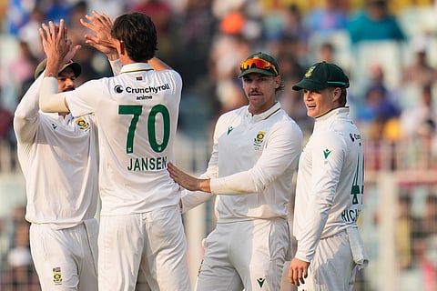 South Africa's Marco Jansen (70) celebrates with teammates after the dismissal of India's Yashasvi Jaiswal on the first day of the first cricket test match between India and South Africa in Kolkata.